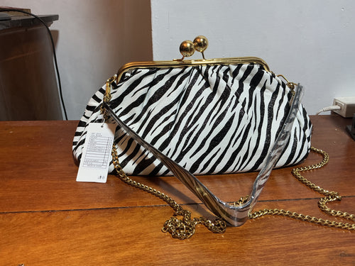 Borsa Clutch in ecopelle,animalier
