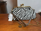 Borsa Clutch in ecopelle,animalier
