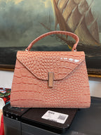 Borsa in ecopelle martellata