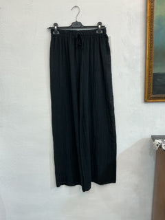 Pantalone gamba larga